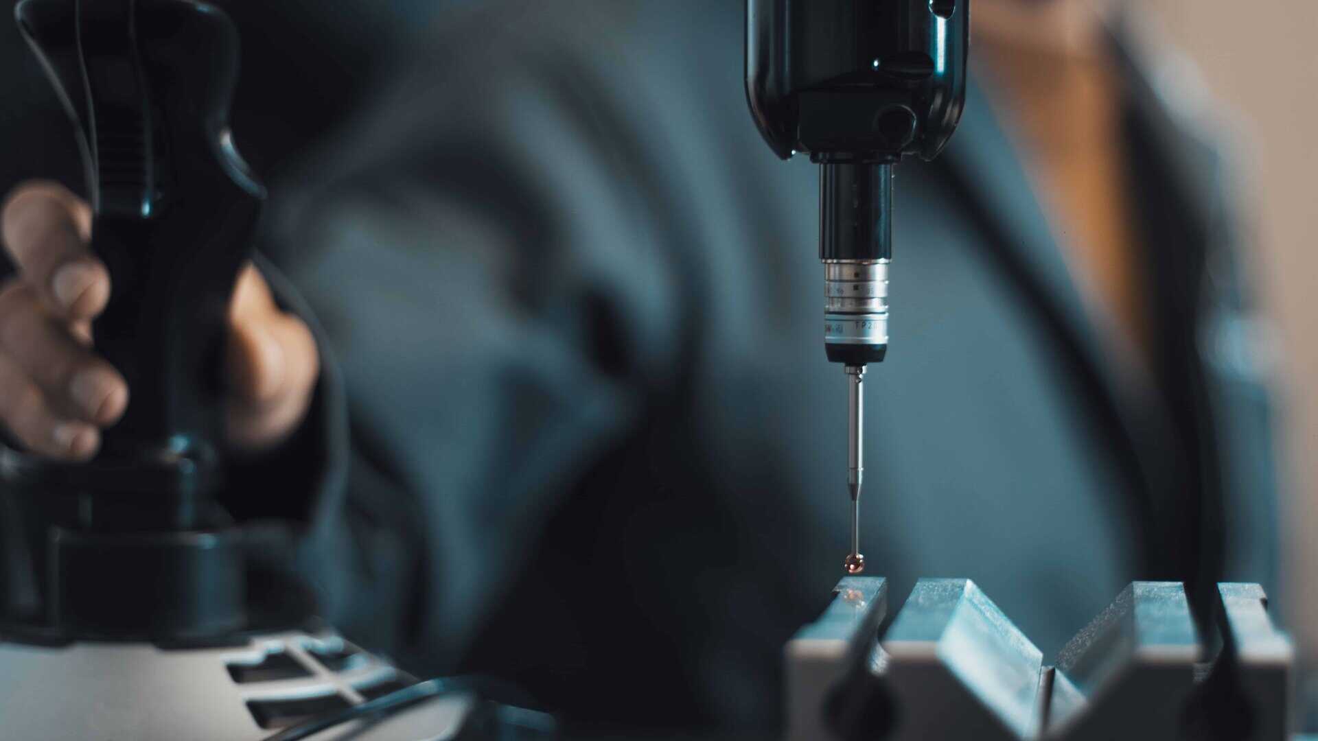 photo metrologie dimensionnelle technicien controle 3d piece industrielle